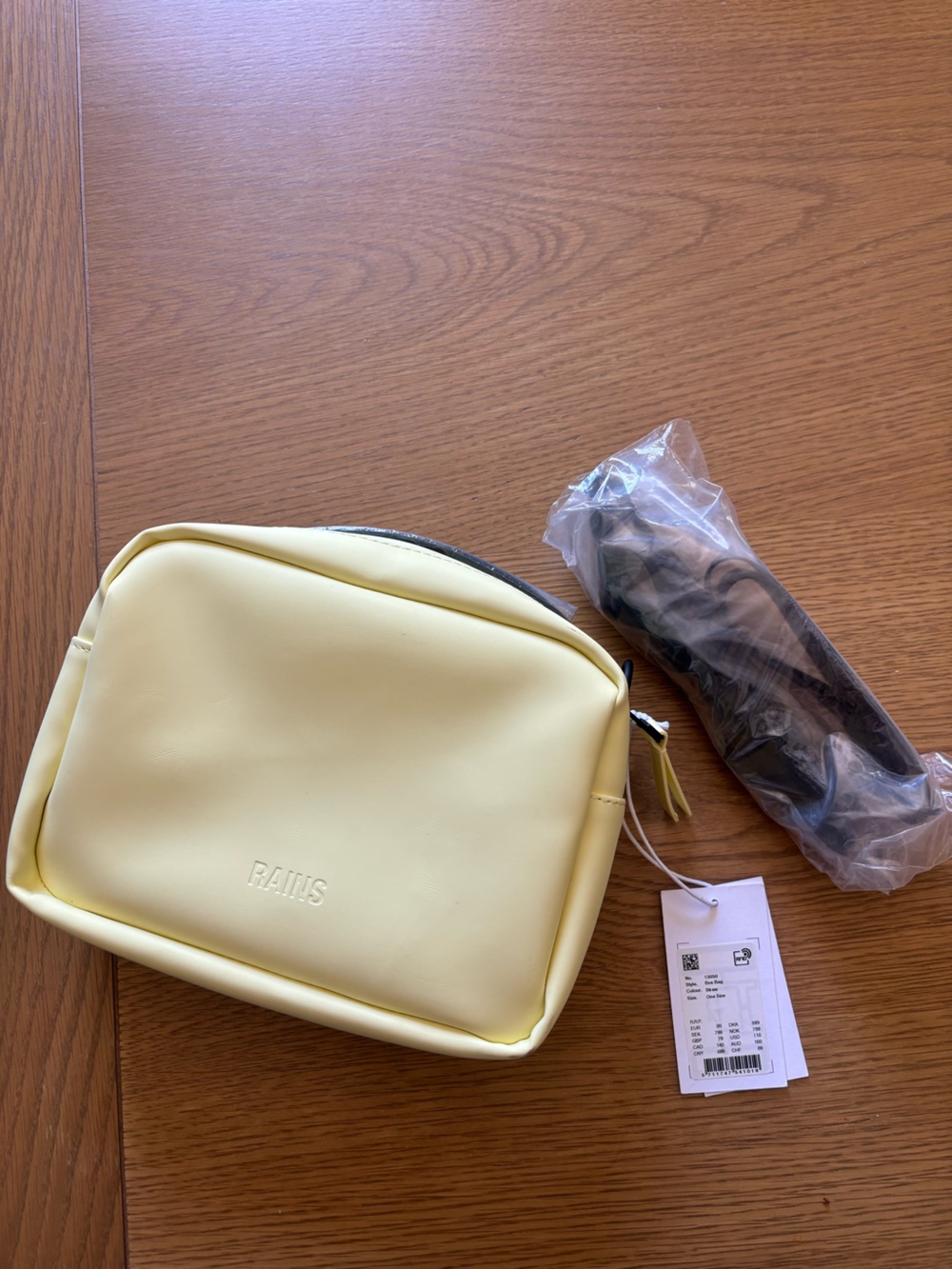 RAINS Butter Yellow Pouch Crossbody Bag